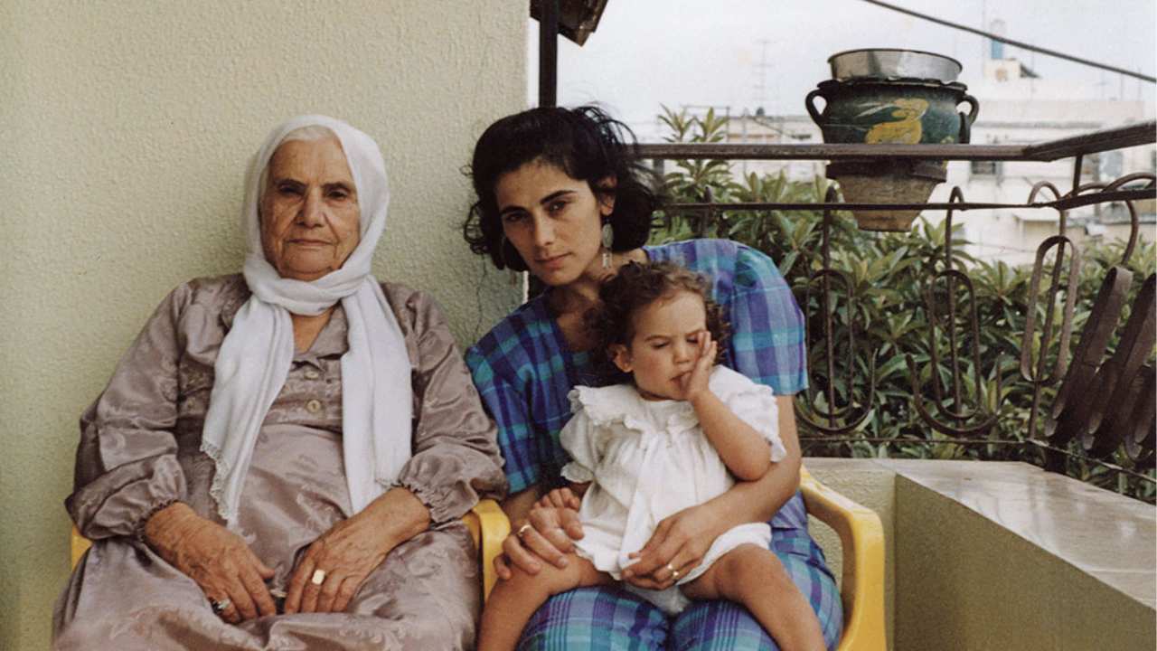 two women and a child sitting together